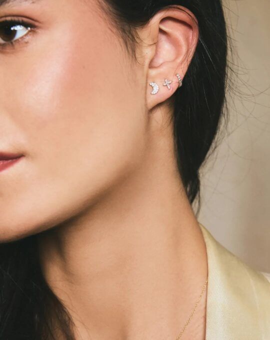 Pendientes en forma de cruz de oro blanco y diamantes mujer